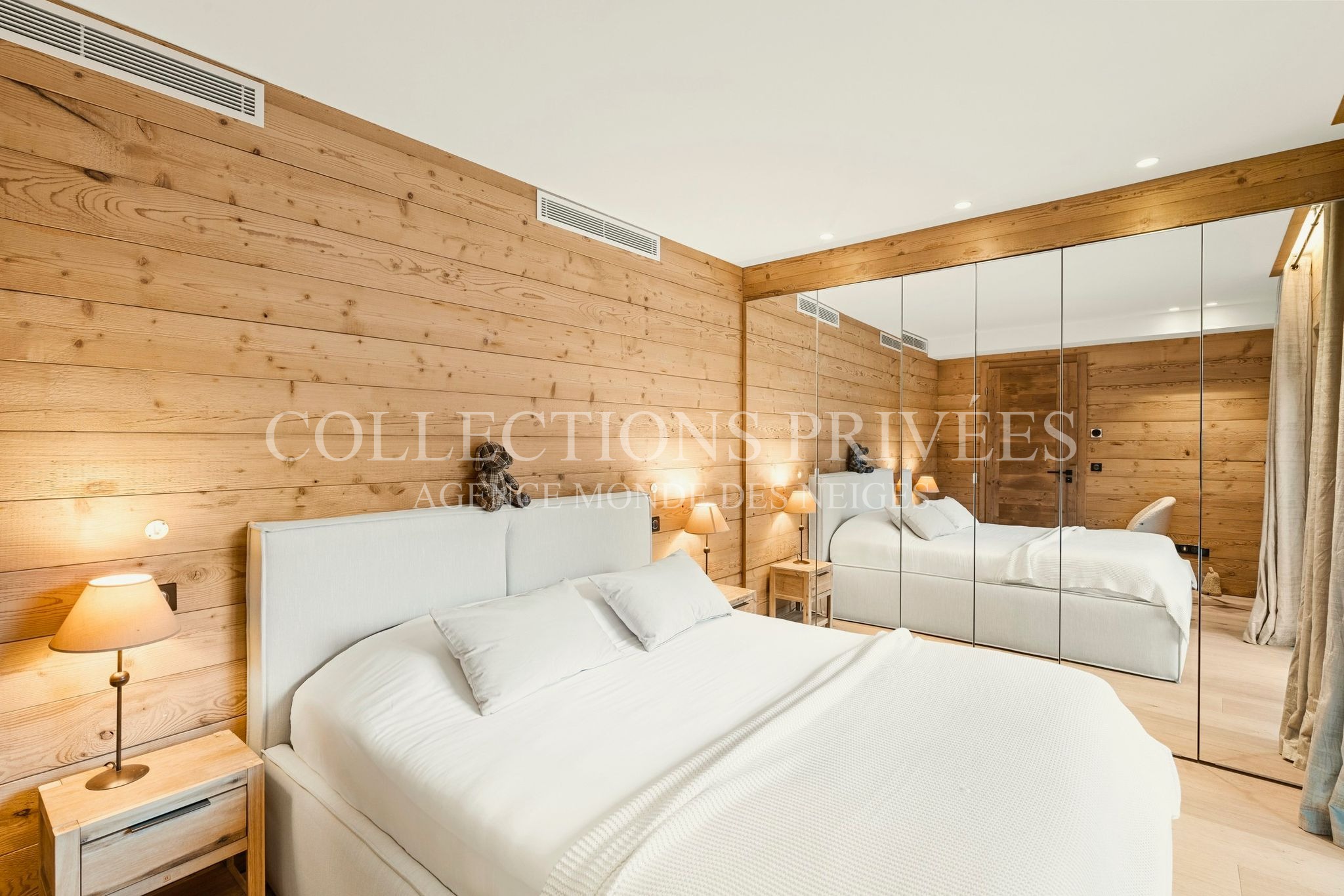 Chambre chalet prestige Auron dressing miroir boiseries