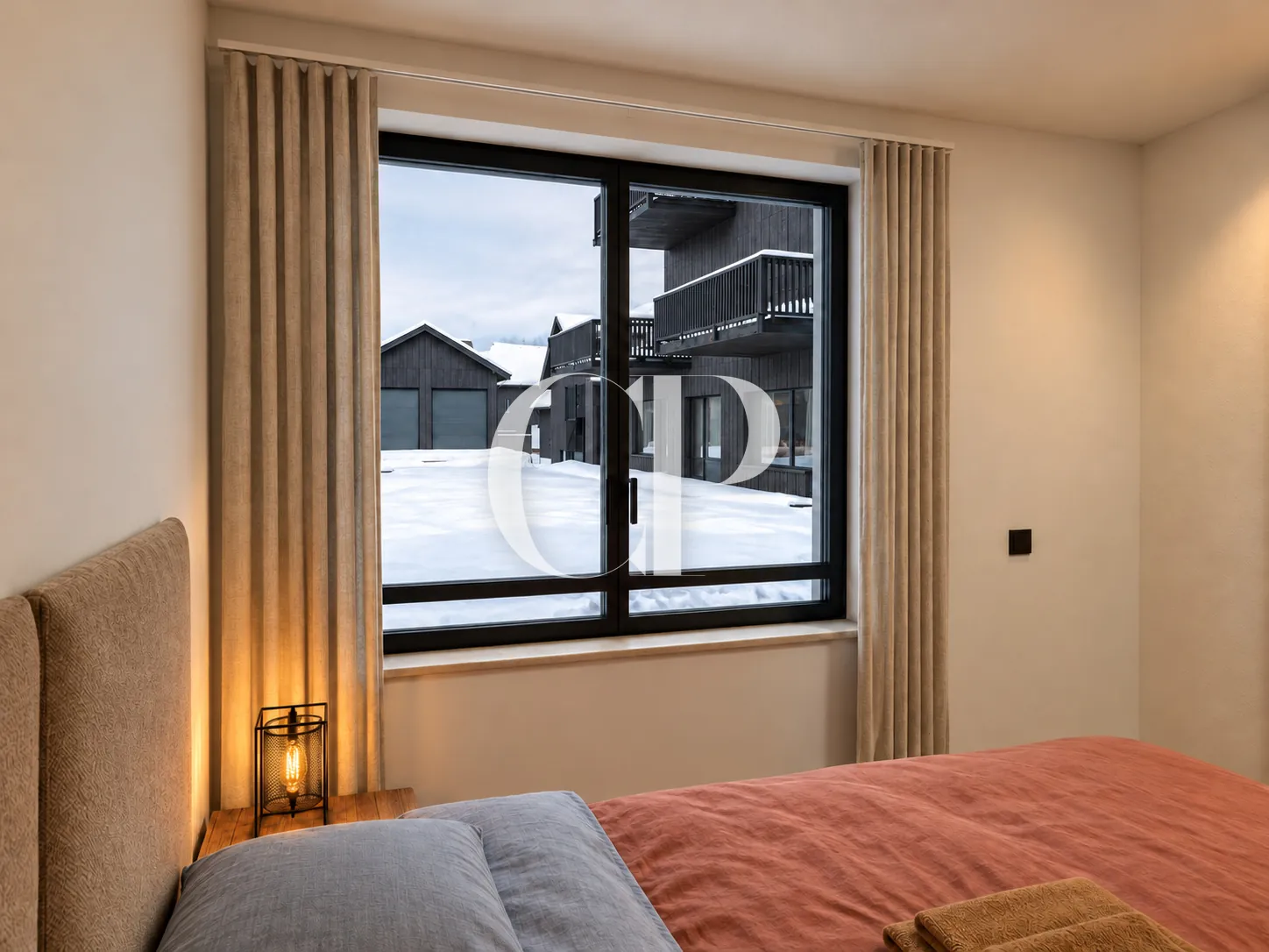 The north-east bedroom, looking onto the hamlet under snow