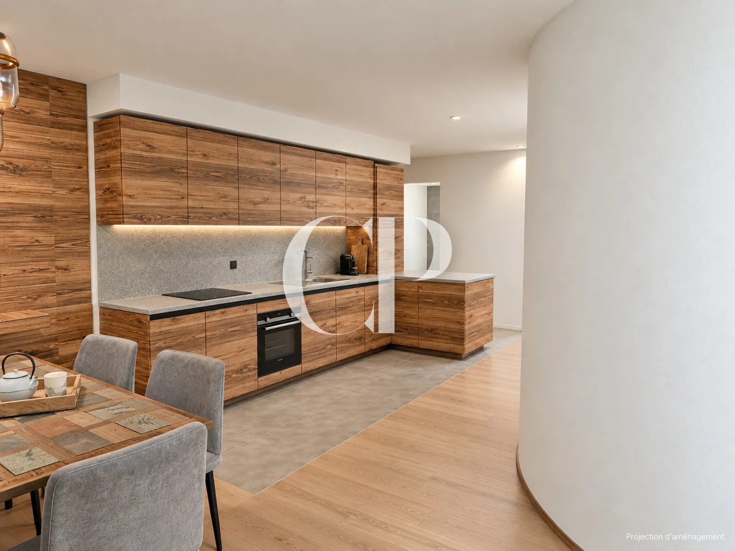 The living space and the open kitchen along the wall