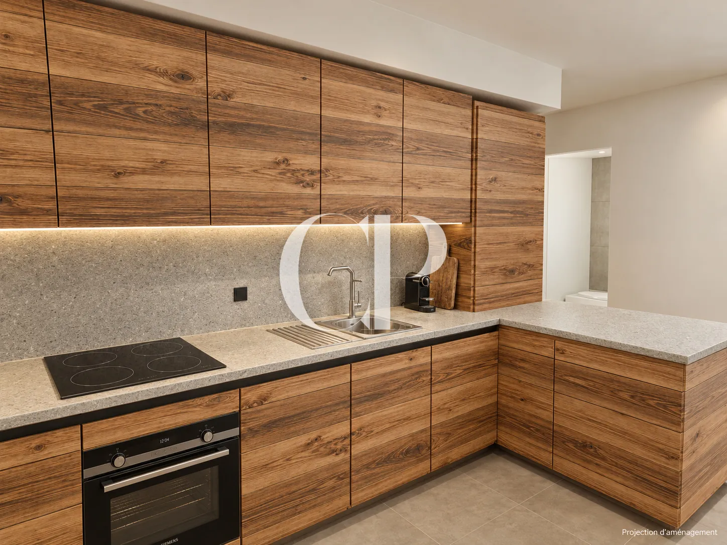 The kitchen, grained wood and pale stone